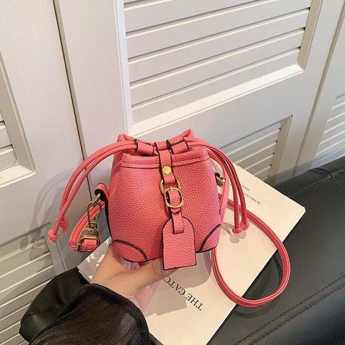 New Mini small bucket bag children's bag Korean style outing girl's crossbody bag baby exquisite accessories compact bag